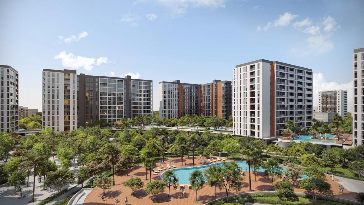 Olfah residential building facades surrounded by lush greenery and pedestrian pathways