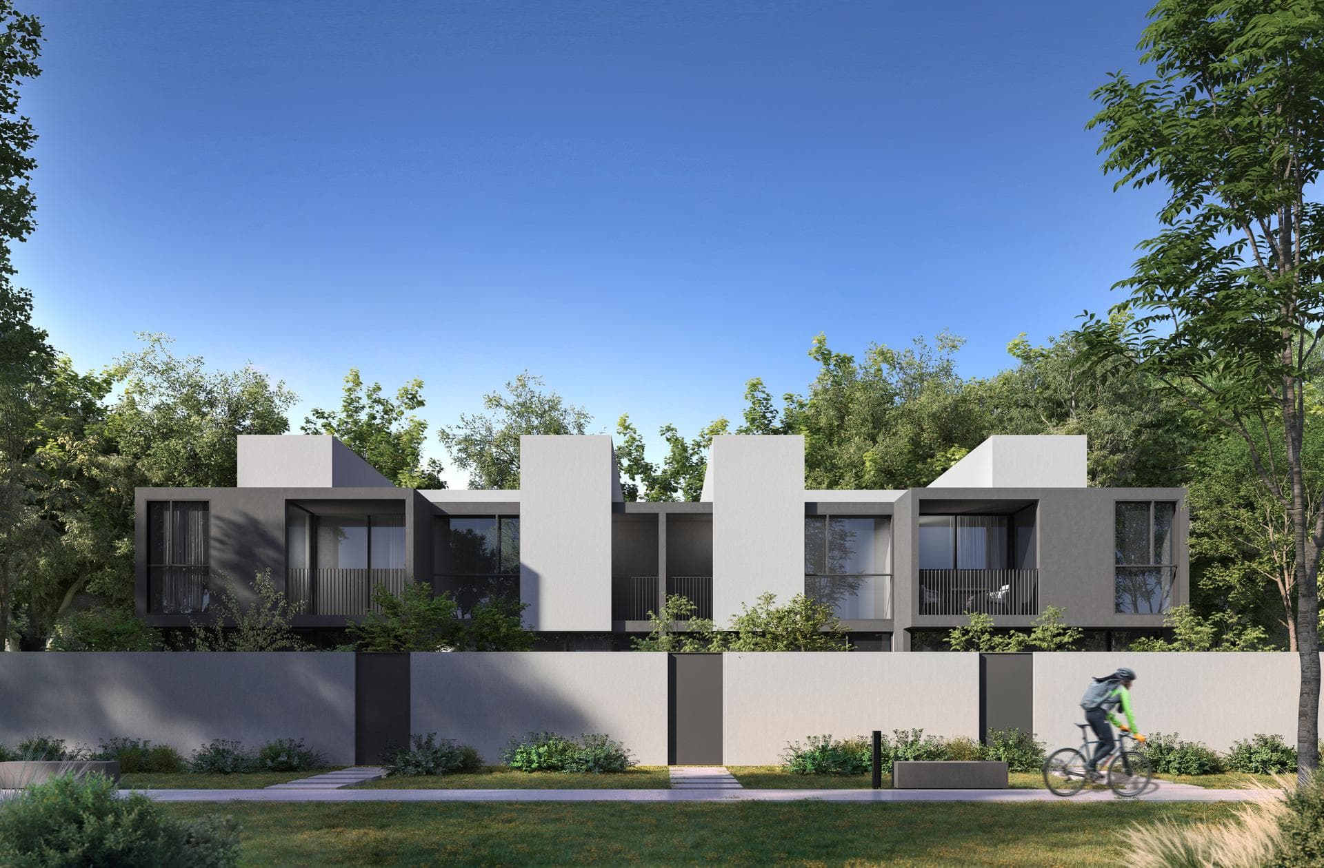 Masaar townhouse streetscape lined with mature trees and forested walkways