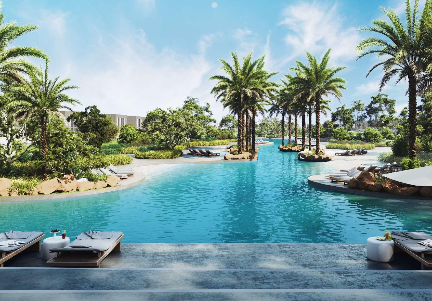 Lagoon-side resort lounge and leisure deck at Hayyan community