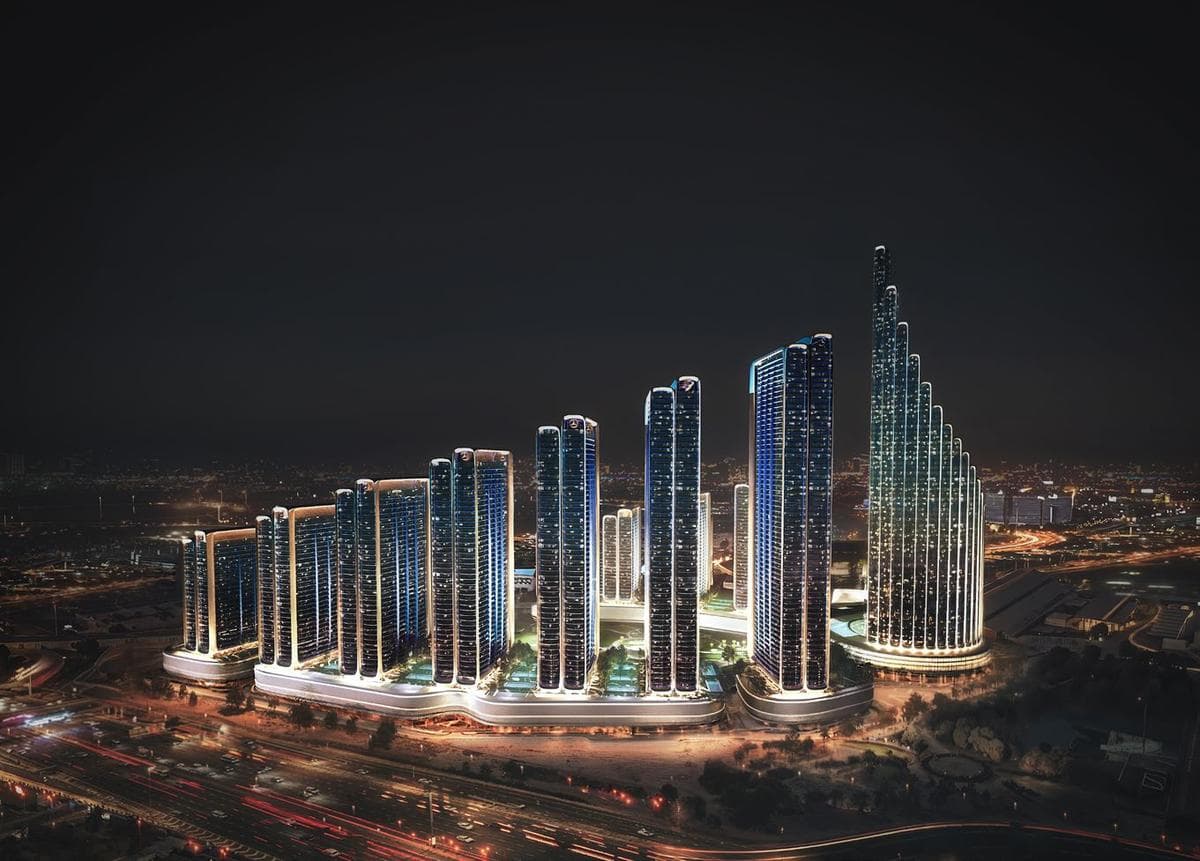 Aerial view of Mercedes-Benz Places twin towers rising above the Dubai skyline