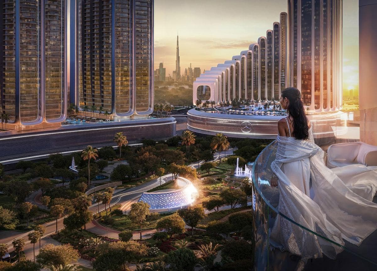 Sweeping aerial view of Mercedes-Benz Places with Burj Khalifa and Dubai Canal in the background